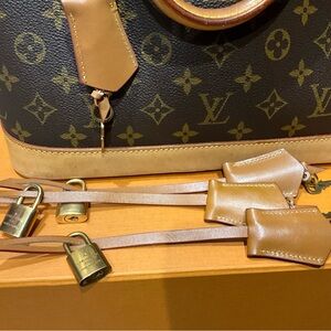 Authentic Louis Vuitton Lock & Key  aftermarket leather Clochette Key bell.